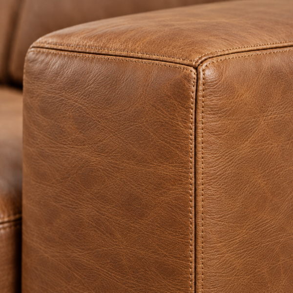 Close-up of cognac leather upholstery for the Abby Sofa